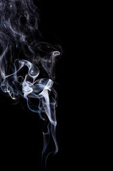 Abstract incense smoke isolated on black background