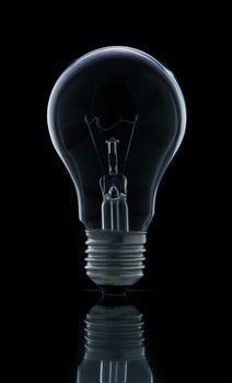 Lamp light bulb isolated on over black background