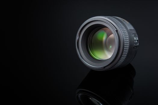 Photographer Camera Lens isolated on black background