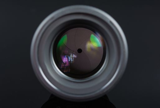 Photographer Camera Lens isolated on black background
