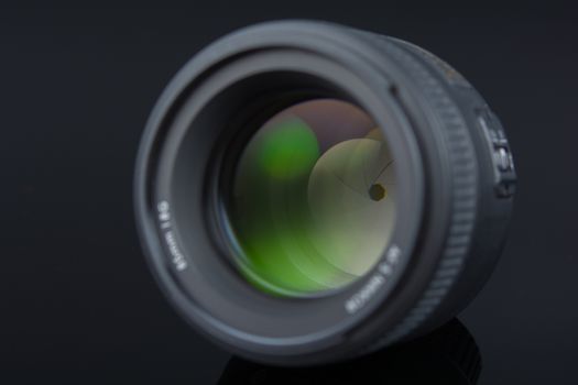 Photographer Camera Lens isolated on black background