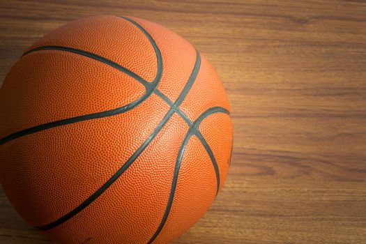 Close up Basketball on wooden floor background