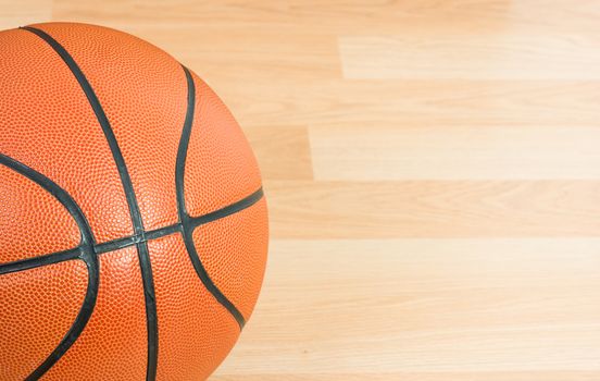 Close up Basketball on wooden floor background