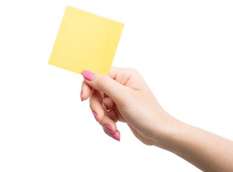Woman hand holding blank yellow notepaper on over white background
