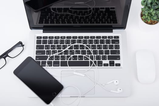 laptop,notebook and mobile phone, smartphone on office desk table.