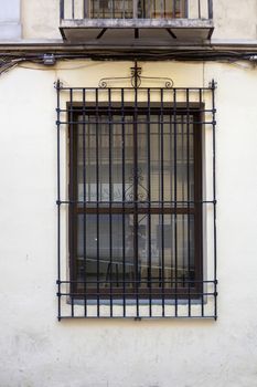 Vintage window on old traditional house in Andalusia, Spain