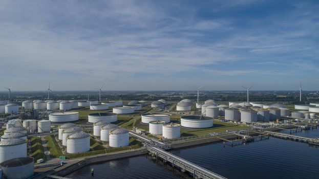 Oil refinery plant from industry zone, Aerial view oil and gas industrial, Refinery factory oil storage tank and pipeline steel