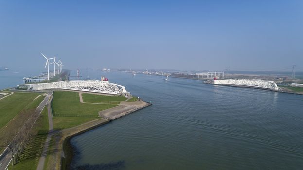 Aerial picture of Maeslantkering storm surge barrier on the Nieuwe Waterweg Netherlands it closes if the city of Rotterdam is threatened by floods and is one of largest moving structures on earth