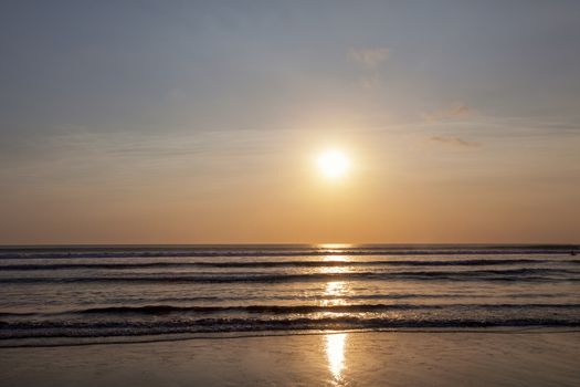 Beautiful sunrise over the tropical beach in Bali Indonesia