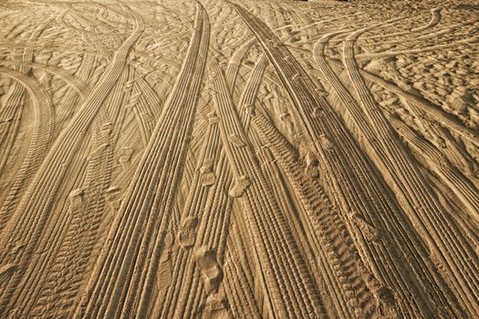 Tracks of cars on the sand in the desert sand