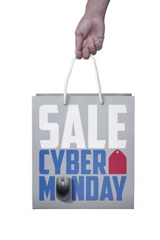 shopper with cyber monday paperbag, PC mouse, laptop. ticket label Sale tag - online shopping concept