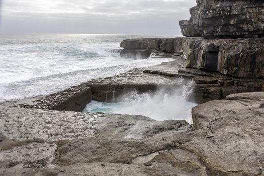 The Worm Hole, natural pool in Inishmore, Aran islands, Ireland - Image