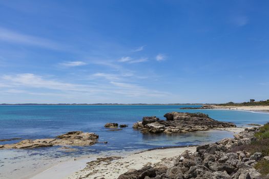 Portland beach, Australia with rocks en blue water on a sunny day - image