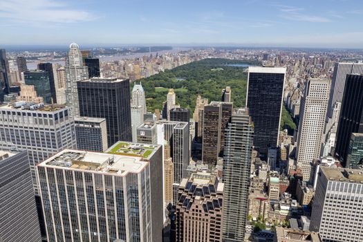 Central Park aerial view, Manhattan, New York. Park is surrounded by skyscraper, USA