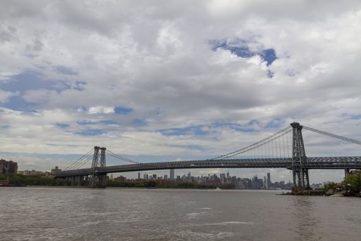 New York City - beautiful sky over manhattan with manhattan bridge, USA