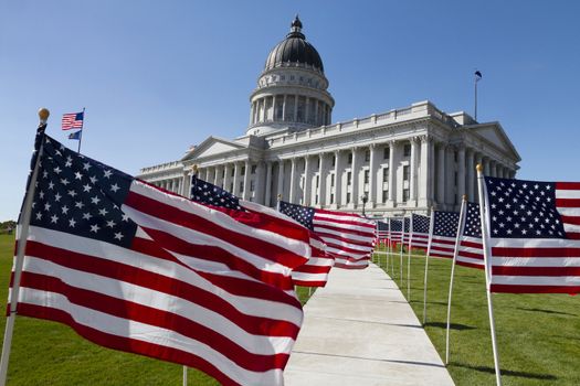 Utah State Capitol in Salt Lake City, Utah, USA. With flags of the USA.