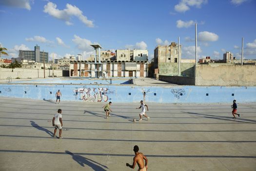 Havana, abandoned swimming pool where young people gather for skateboarding and football.