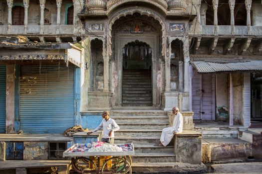 Undefined people at work in street in Jodhpur, India