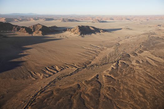 Hot air balloons landing on the sands of the Sossusvlei Desert, Sesriem, Namibia