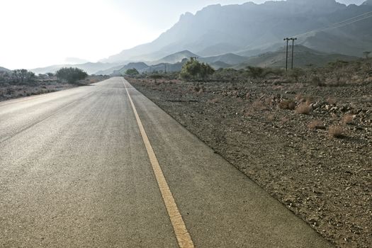 view of a road leading to the Jebel Shams in Hajar mountains in Oman