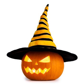 Jack O Lantern Halloween pumpkin with witches hat isolated on white background