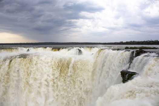 Famous Devil's Throat at Iguazu Falls, one of the world's great natural wonders, on the border of Argentina and Brazil