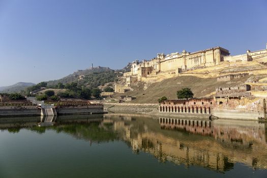 Lake and view of Amber Fort on the outskirts of Jaipur, Rajasthan, India