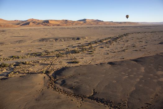 Hot Air Balloon travel over Africa desert. Namibia