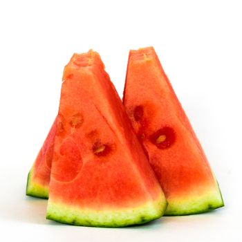 Bunch of small slice cuts of watermelon isolated on white background.