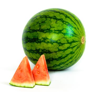 Cutout watermelon with slice cuts isolated on white background. Whole mini watermelon and cutout with clipping path and copy space.