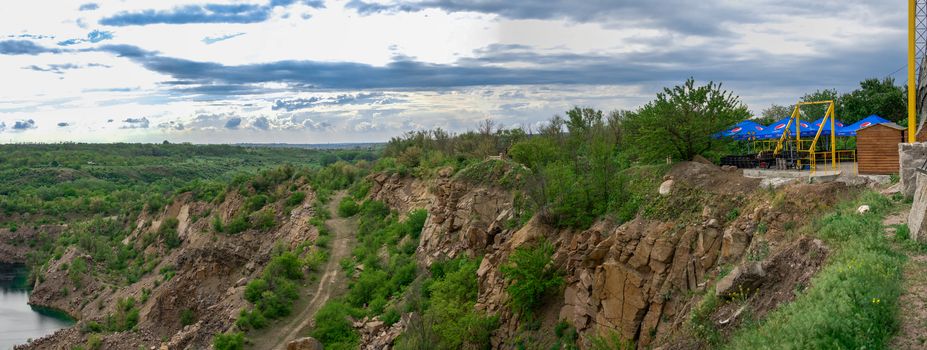 Migeya, Ukraine - 05.13.2019. Radon Lake in a place of flooded granite quarry near the Southern Bug river in Mygiya village, Ukraine