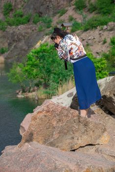 Migeya, Ukraine - 05.13.2019. Active rest and adventures on the Radon Lake in a place of flooded granite quarry near the Southern Bug river in Mygiya village, Ukraine