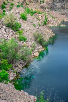 Radon Lake in a place of flooded granite quarry near the Southern Bug river in Mygiya village, Ukraine