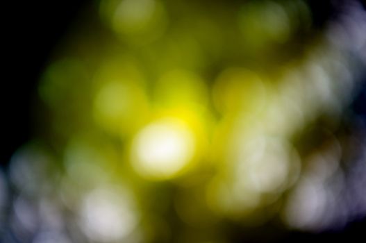 Colorful background with natural bokeh texture and defocused sparkling lights. DARK BACKGROUND FOR HALLOWEEN NIGHT 