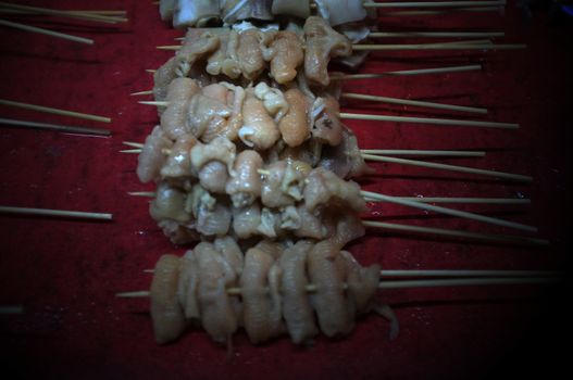 Asian street food Grilled with Chinese Sichuan Peppers (Ma-la) style , Seller prepare for meals, balls, seafoods and vegetables grill with Sichuan pepper.Thai Street food