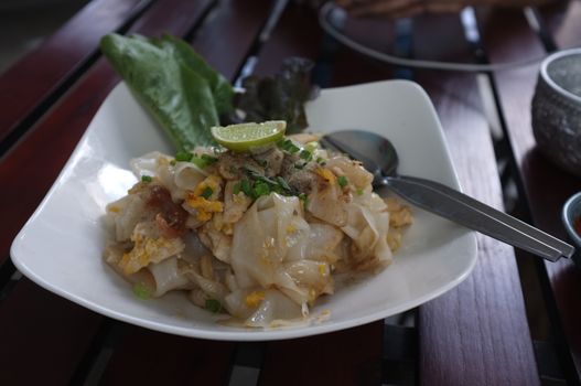 Stir Fried Rice Noodle with Chicken and Pickled squid or Kuaitiao khua kai  Recipe The smell of the pan burns a little bit, deliciously pleasing