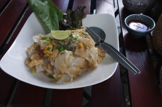 Stir Fried Rice Noodle with Chicken and Pickled squid or Kuaitiao khua kai  Recipe The smell of the pan burns a little bit, deliciously pleasing