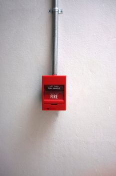 Fire alarm on the wall of shopping center.

