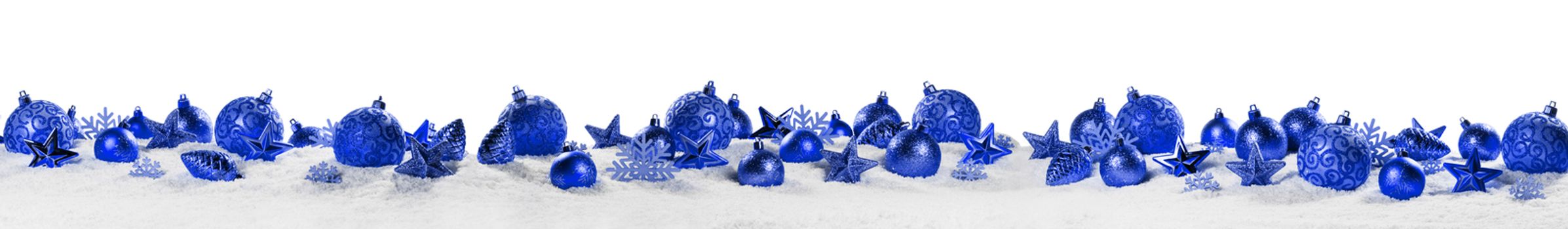 Christmas border with blue ornaments on snow isolated on white background