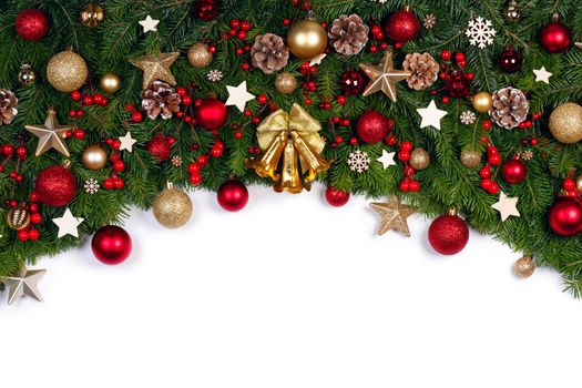 Christmas Border frame of tree branches on white background with copy space isolated, red and golden decor, berries, stars
