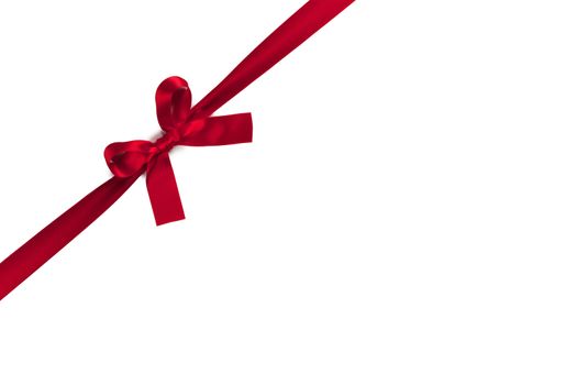 Red gift bow isolated on white background