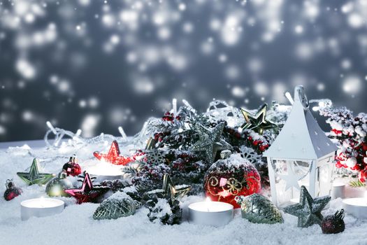 Christmas holidays card with gifts , balls and glowing lantern in snow