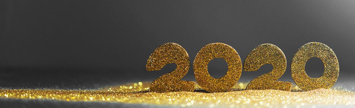 2020 New Year luxury design concept. Golden 2020 New Year horizontal template with golden glitter on blue backgound