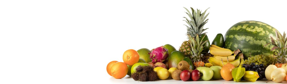 Fresh tropical fruits harvest pile isolated on white background with copy space for text