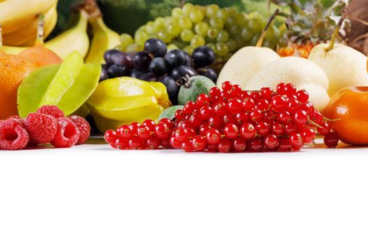 Fresh tropical fruits harvest pile isolated on white background with copy space for text