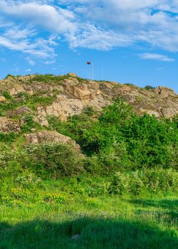 The rocky banks of the Southern Bug River near the village of Migiya in Ukraine on a sunny summer day