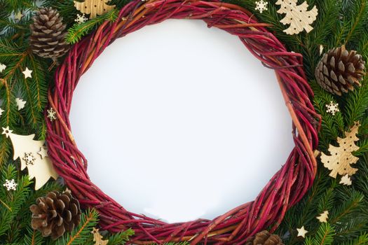 Christmas background with wreath and fir tree branches and white background copy space for text border frame for text