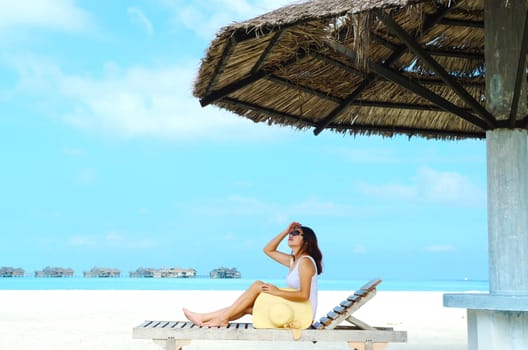 Portrait of happy  woman at  Maldives island. Travel and Vacation. 