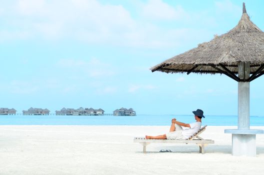 Portrait of happy man at  Maldives island. Travel and Vacation. 