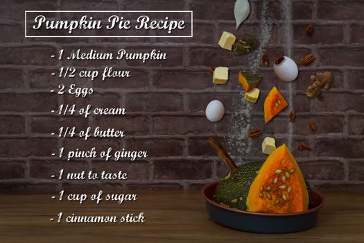 Ingredients of a pumpkin pie, falling towards a kitchen pan. Cinnamon, eggs, milk, butter, sugar, nut, ginger